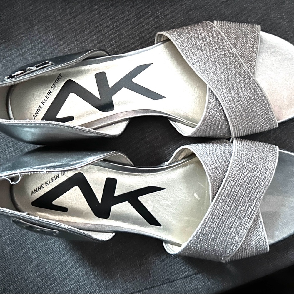 New .. Anne Klein silver sparkly flats. 
Size 7 1/2.